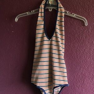 Rust/orange and navy Striped bodysuit.